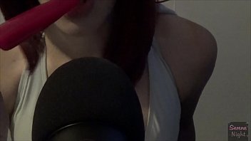 Latina sucking on a frozen pop