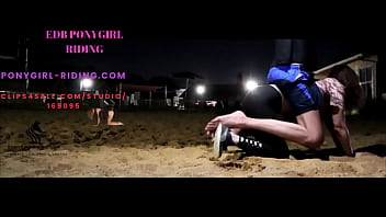 Man rides his pony without kneepads on the sand