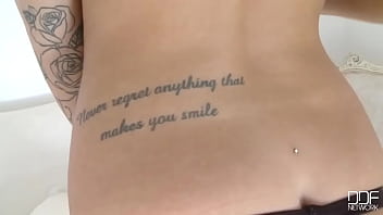 Her tattoos tell a sexy tale