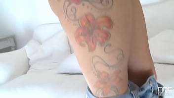 Her tattoos tell a sexy tale