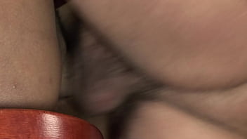 Hot ebony babe helps herself with doing business using her pussy