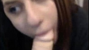 Stunning eyes camwhore sucking on a toy