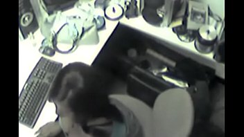 Bored secretary spied as she masturbates