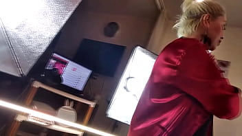 Mature slut wife in a red satin negligee with a ponytail on her head and a dick in her mouth