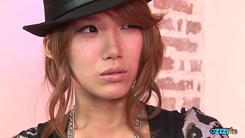 A solitary female engaging in self pleasure on a zebra patterned couch just for our observation