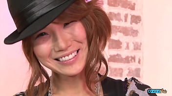 A solitary female engaging in self pleasure on a zebra patterned couch just for our observation