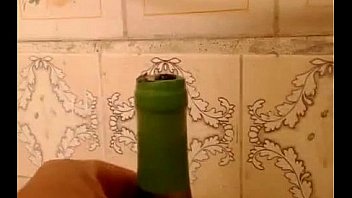 Busty shows her tits in her house