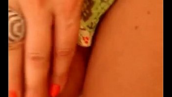 Busty shows her tits in her house