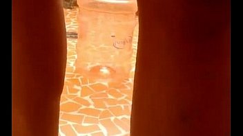 Busty shows her tits in her house