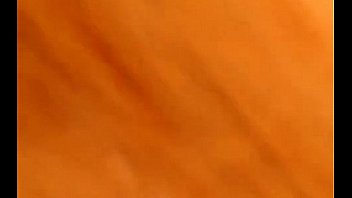 Busty shows her tits in her house