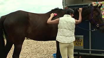 A really busty girl sucks on a dick and then gets fucked in a trailer