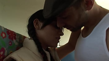 A really busty girl sucks on a dick and then gets fucked in a trailer