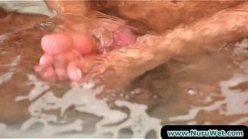 Gorgeous babe gives a nuru massage 22