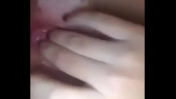 Tanned girl fingered hard