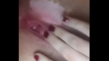 Tanned girl fingered hard
