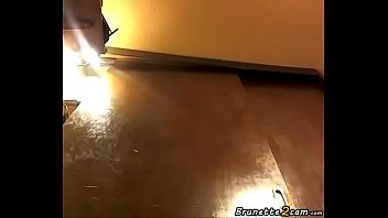 Curly brunette masturbation from the floor