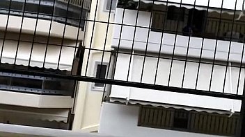 In front of her window