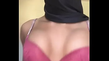 Muslim girl solo tit tease • hijab babe caressing her big arab boobs like a good slut