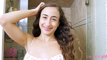 Promising brunette talent enjoys a sensual bath