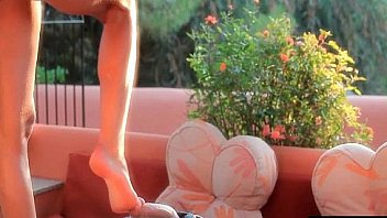 Flexy blonde slut jerks hard cock with her feet and lips