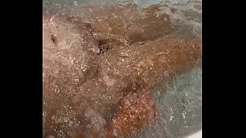 Soaking in a tub cant wait to get my fingers deep in my pussy