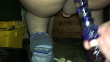 Stuffing glass dildo in my butt