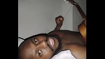 Translating Other Meanings Of Horns In The Air While Singing And Playing Guitar Naked thumbnail