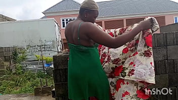An african mum was feeling her self and her neighbor was peeping at her from the window An african mum was feeling her self and her neighbor was peeping at her from the window