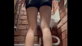Public bathroom playtime in a public bathroom dressed in a black top and shorts i squat with my legs wide mas Public bathroom playtime in a public bathroom dressed in a black top and shorts i squat with my legs wide mas