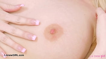 Alluring blonde model naked close up