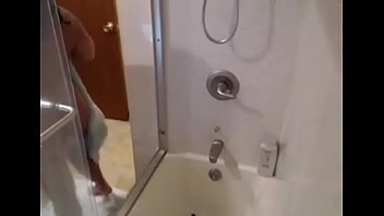 Milf showers and plays on cam