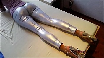Ania in silver leggings gloves high heels