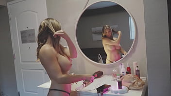 Getting ready for the show topless