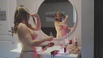 Getting ready for the show topless