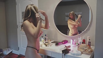 Getting ready for the show topless