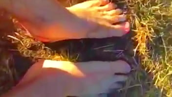 Foot Fetish Video Rubbing Feet In Mud Outdoors thumbnail