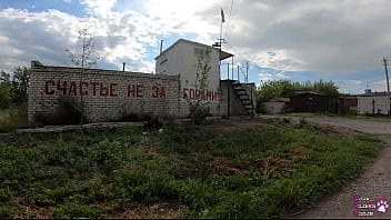 Horny student gives blowjob behind garages