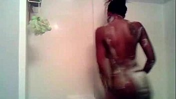 Ebony girl takes a hot and foamy shower
