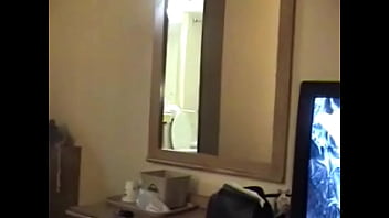 Donna trying on a new outfit before sex