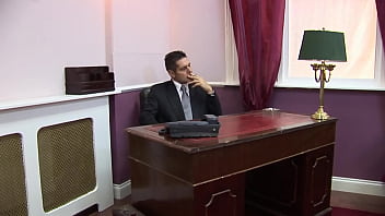 She gets her treat too as she lays back on his desk and lets him eat her out before the