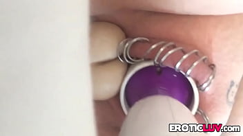 Horny babe toys her pierced pussy