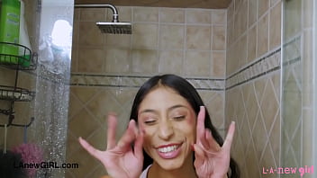 Pretty brunette model enjoys a sensual bath