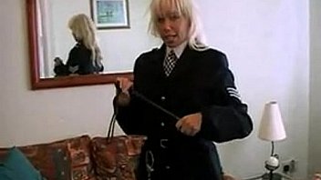 Blonde officer strips and masturbates