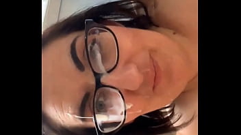 Candidsandra gets a thick load of cum all over her glasses