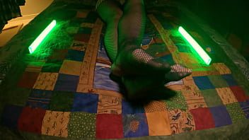 Sensual perfect feet peek through fishnet pantyhose