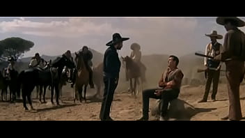 Cowboy Is Staked Out On The Ground By The Outlaw Gang They Tie Wet Rawhide Thong Around His Throat And Left Him To His Fate Under Hot Sun thumbnail