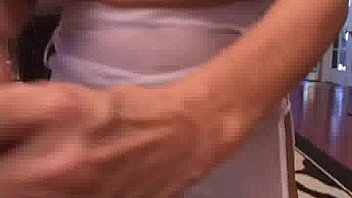 A hot blonde milf is sucking cock and tit fucking