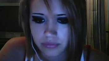Emo webcam girl strips