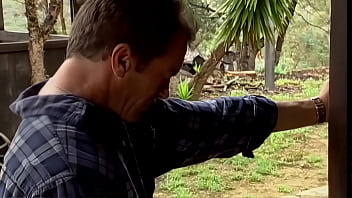 Riley evans is outdoors laying on a couch while not wearing any bra or panties allowing