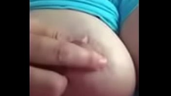 Wife playing with tit for husband